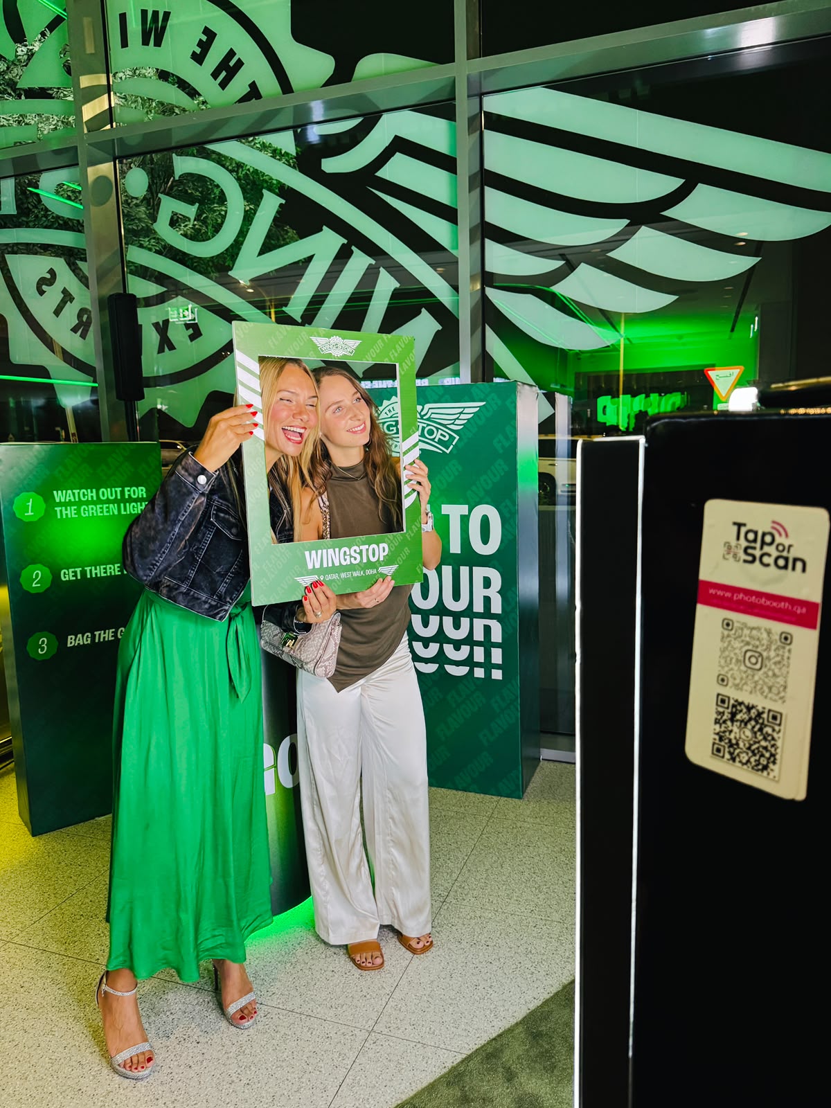 Branded photobooth activation for the Wingstop restaurant opening at West Walk Doha